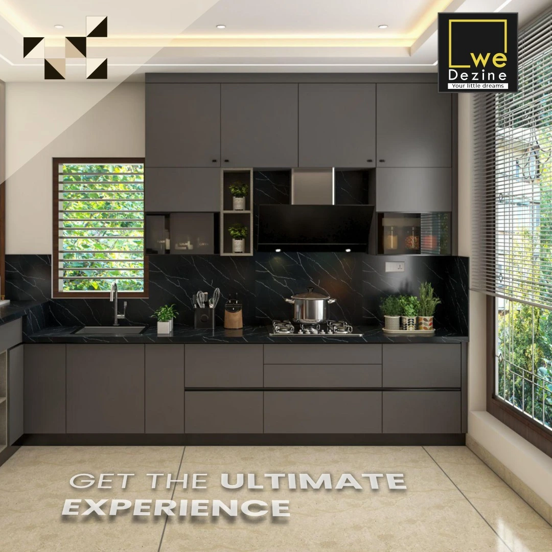 Modern modular kitchen by interior designers in Chikmagalur with sleek cabinets, island counter, and elegant lighting.