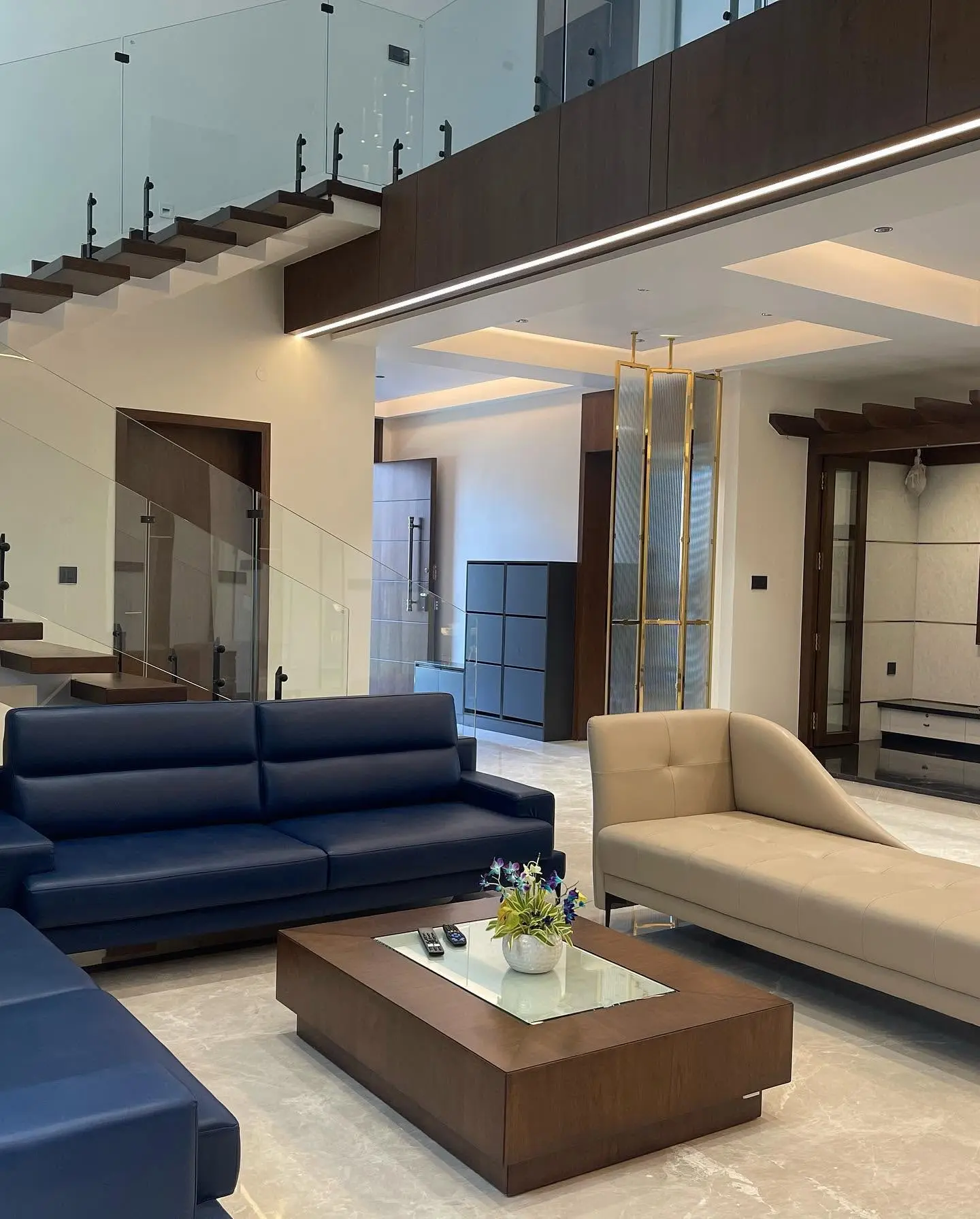 Luxury duplex living room by Interior Designers in Bangalore