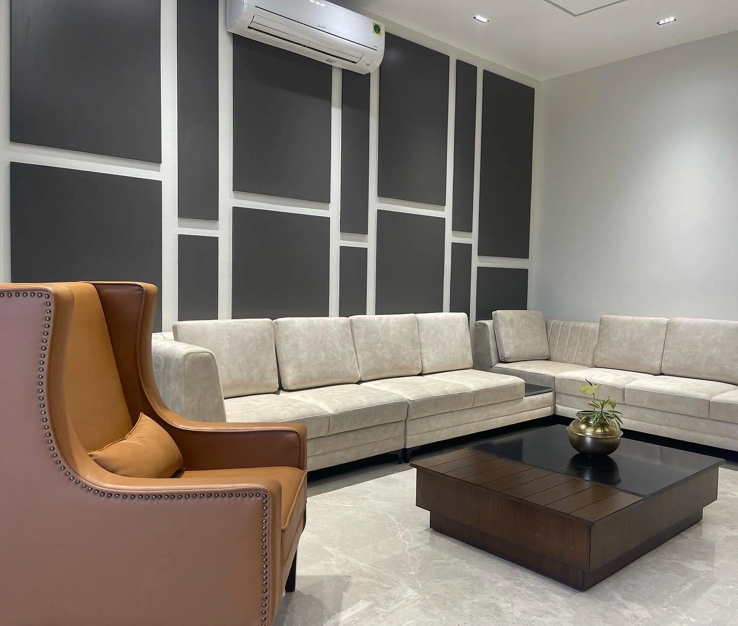 Modern TV unit and statement wall by WeDezine Studio
